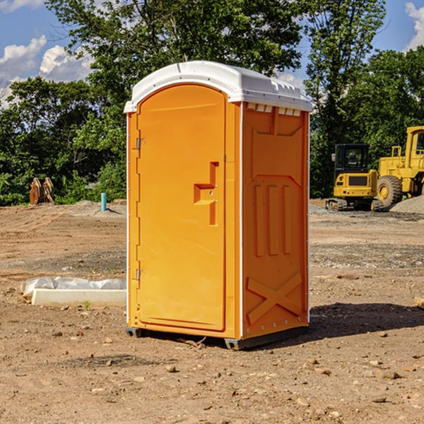 how often are the porta potties cleaned and serviced during a rental period in Macon County